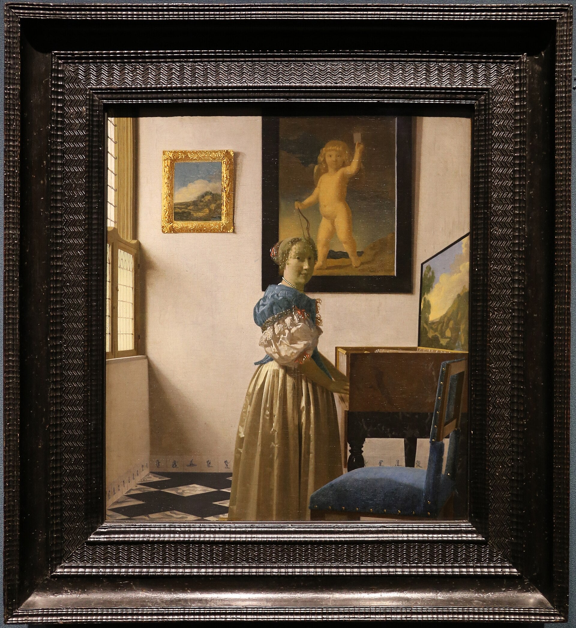 Dáma stojící u virginalu - Johannes Vermeer
