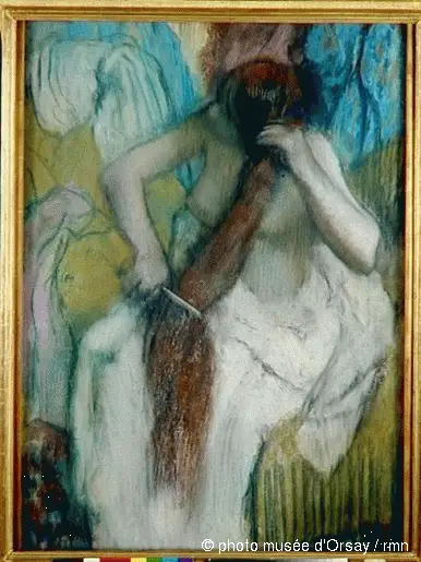 Žena se česající - Edgar Degas