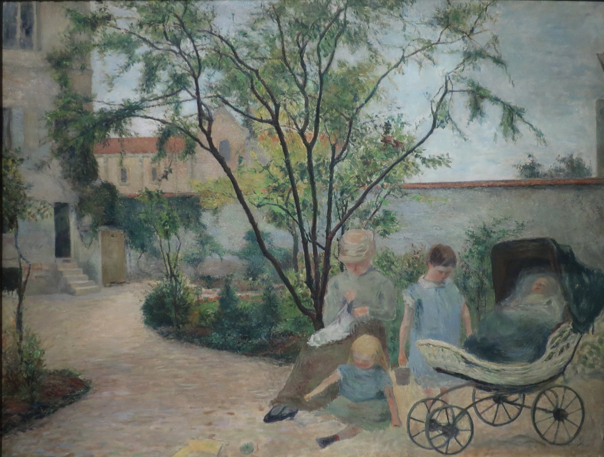 Malířova rodina v zahradě, ulice Carcel - Paul Gauguin