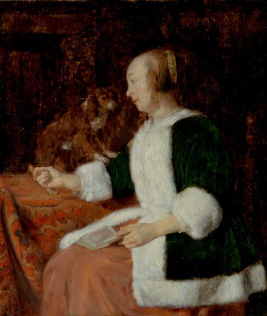 Une femme avec un livre sur les genoux et un chien à ses côtés - Gabriel Metsu