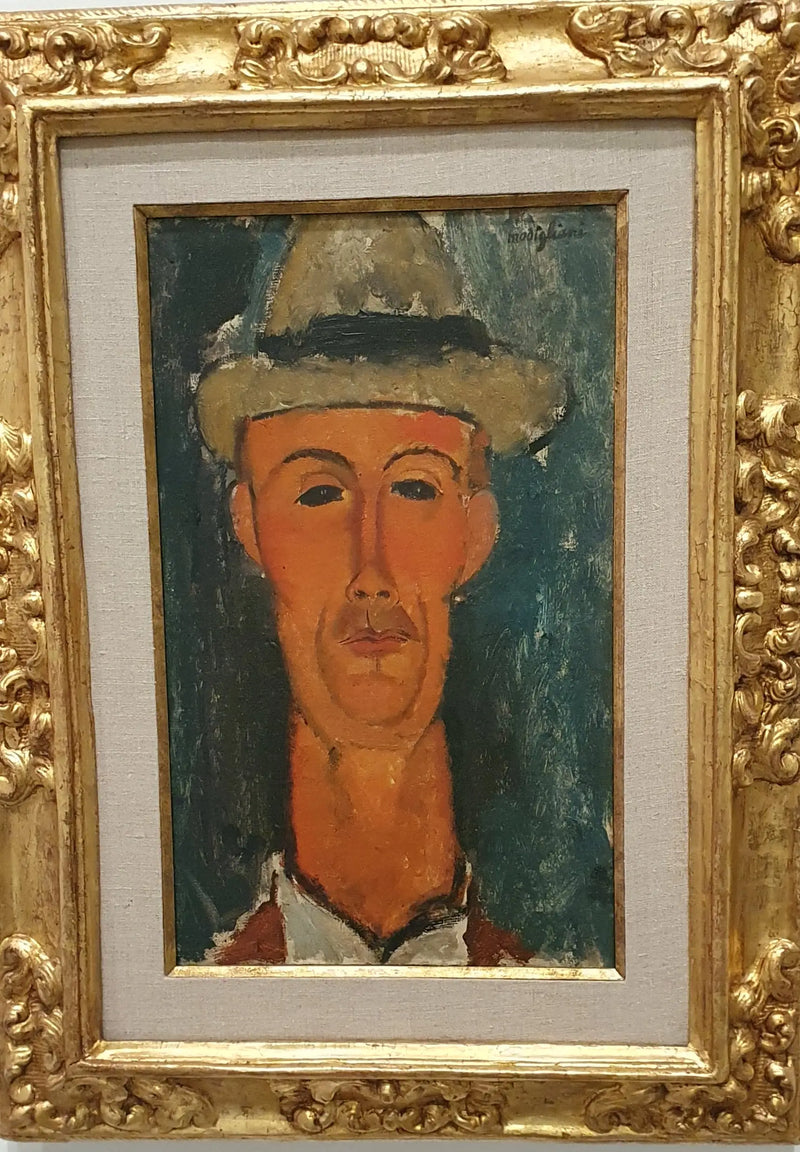 Portrét Gastona Modota v klobouku - Amedeo Modigliani