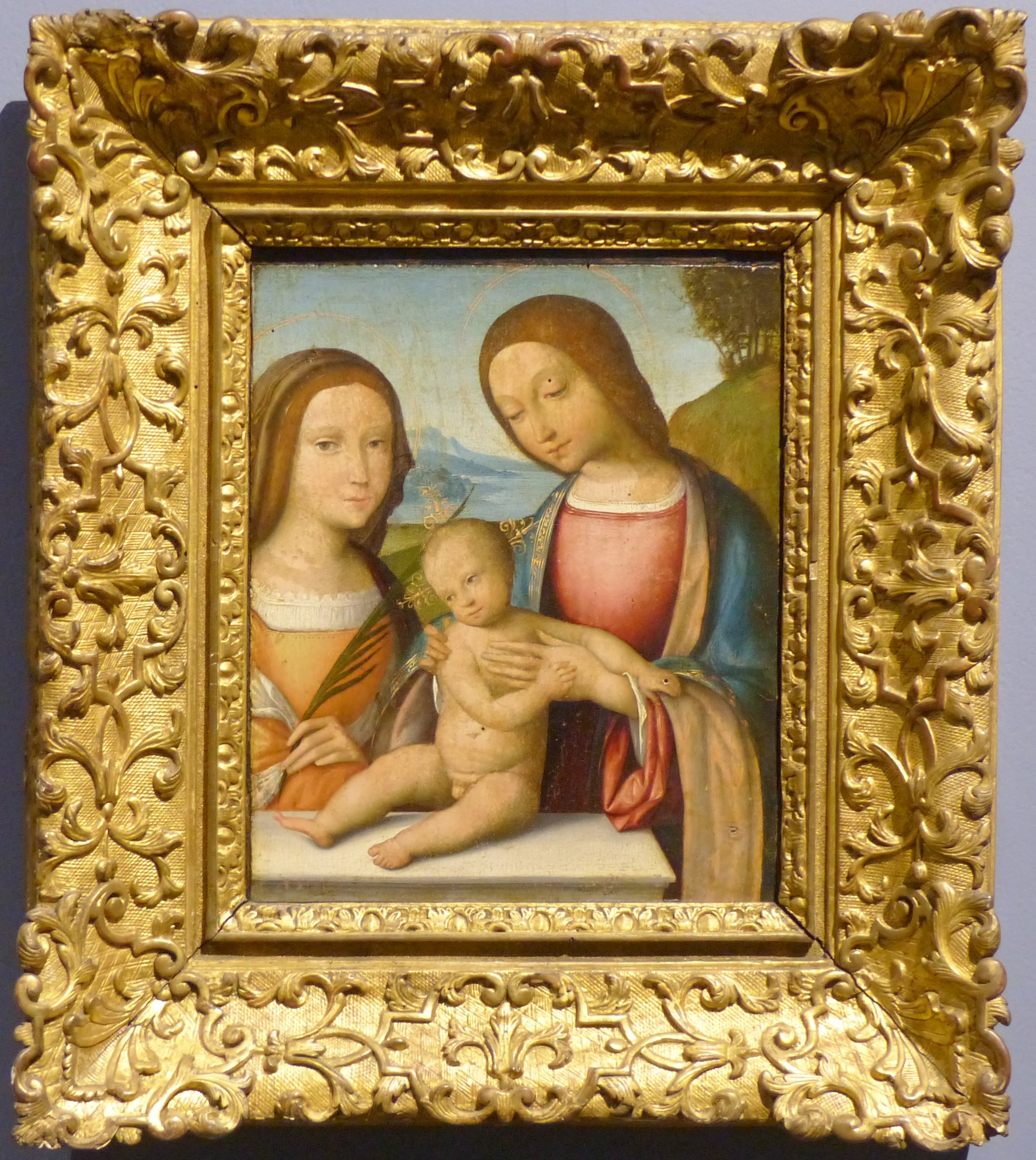 La Vierge et l'Enfant avec une sainte martyre - Benvenuto Tisi