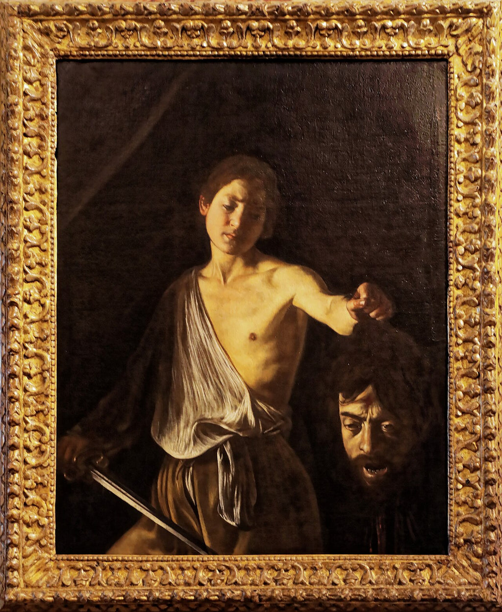 David s Goliášovou hlavou - Caravaggio
