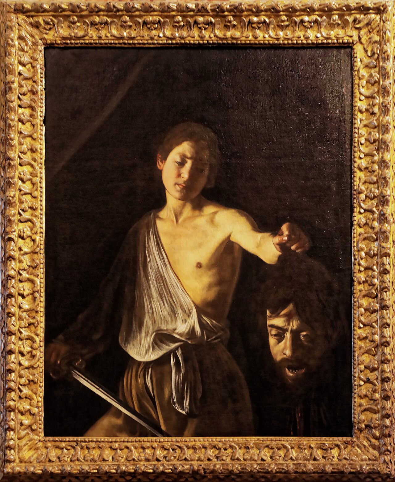 David s Goliášovou hlavou - Caravaggio