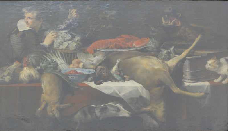 Scène de cuisine avec du gibier et des légumes, un garçon de cuisine tenant une grappe de raisin. - Frans Snyders